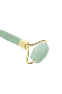 CatMoz jade facial roller with a gold frame, featuring a pale green stone for cooling skincare and reducing puffiness.